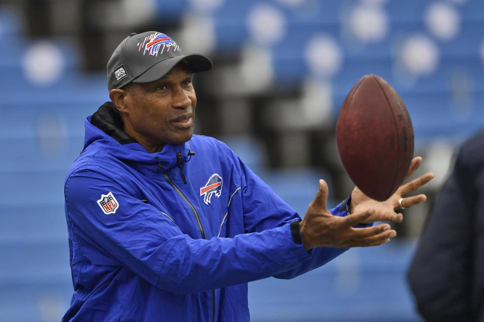 FILE - Buffalo Bills defensive assistant Leslie Frazier catches a ball before an NFL football game against the Houston Texans, Sunday, Oct. 3, 2021, in Orchard Park, N.Y. Bills defensive coordinator Leslie Frazier is taking a year off from coaching with plans to return for the 2024 season, the team announced on Tuesday, Feb. 28, 2023. (AP Photo/Adrian Kraus, File)