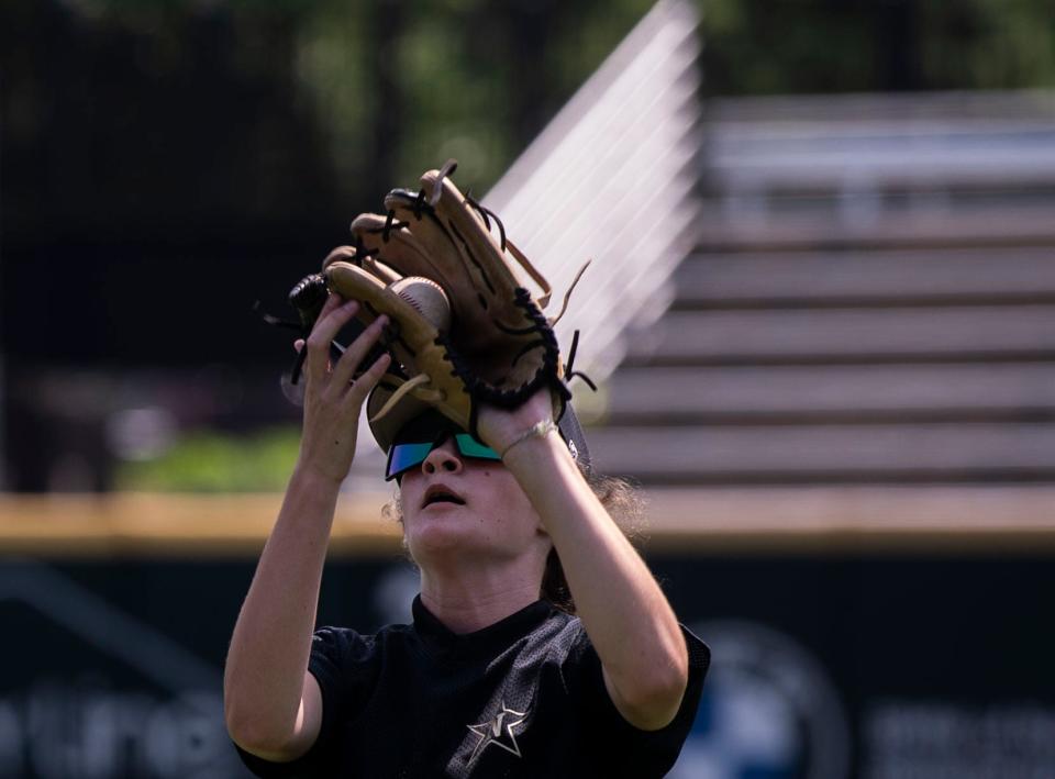 Stella Weaver catches the ball during practice for the Nolensville Little League team at Hawkins Field at Vanderbilt in Nashville , Tenn., Monday, July 17, 2023.