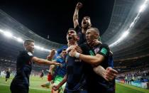 Soccer Football - World Cup - Semi Final - Croatia v England - Luzhniki Stadium, Moscow, Russia - July 11, 2018 Croatia's Mario Mandzukic celebrates scoring their second goal with teammates REUTERS/Carl Recine