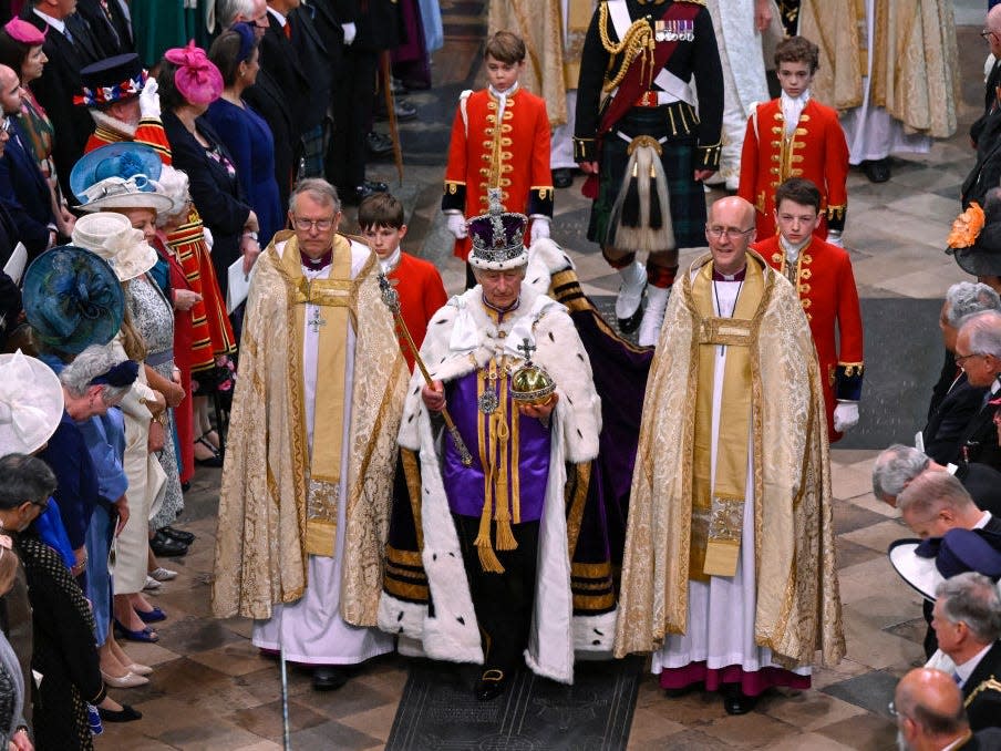 King Charles III departs the Coronation service at Westminster Abbey on May 06, 2023 in London, England.