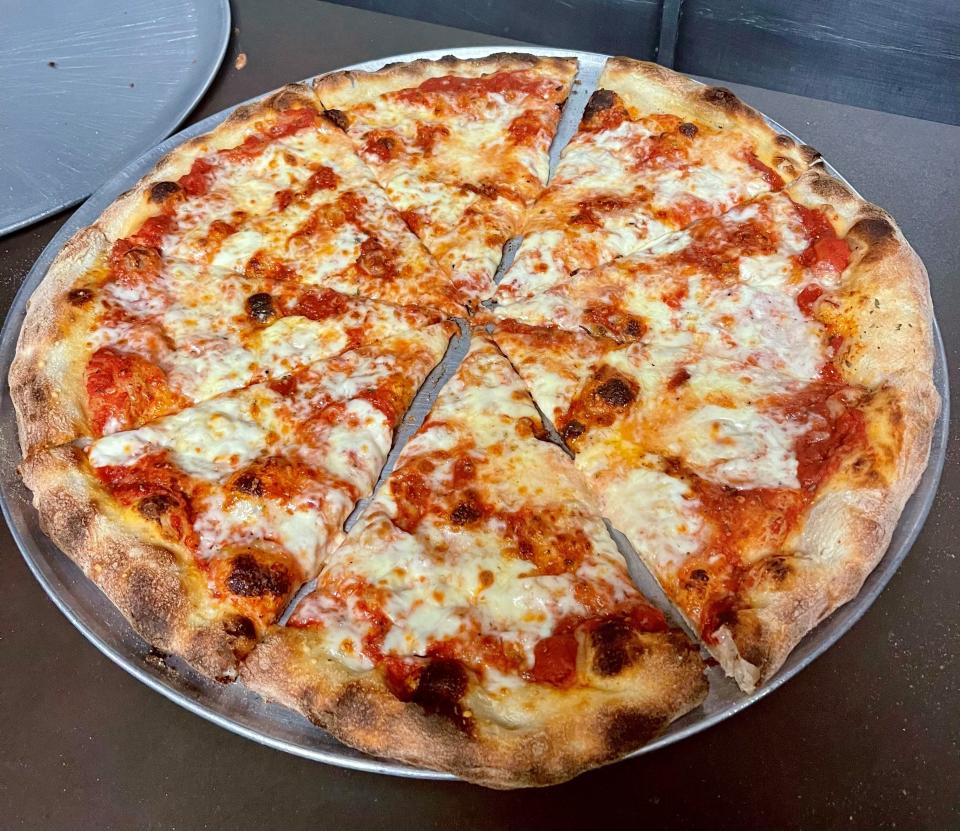 This specialty pizza from J&G Family Pizzeria in Brick has tomato sauce, oregano, Grana Padano cheese, shredded mozzarella and fresh mozzarella.