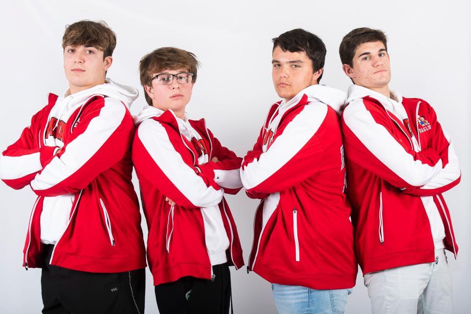 (From left) Bermudian Springs wrestlers Kayden King, Jakson Keffer, Caden Dull and Bryce Harner pose for a group photo during YAIAA winter sports media days Thursday, November 9, 2023, in York.