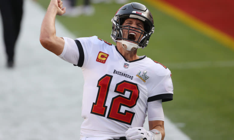 Tom Brady #12 of the Tampa Bay Buccaneers shouts as he takes the field before Super Bowl LV