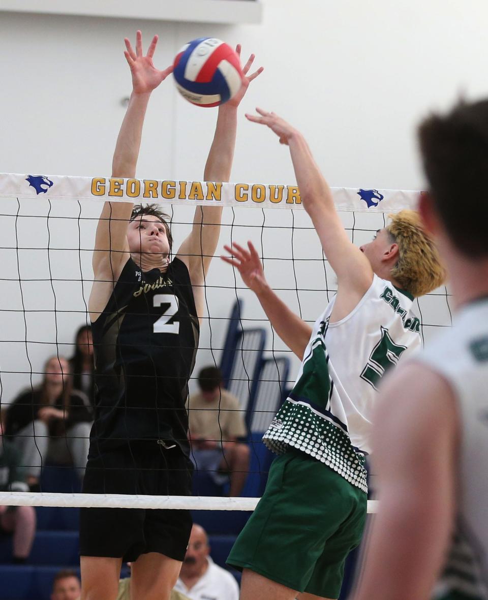Southern Regional's Jack McKenna (#2) block a shot from Colts Neck's Ryan Westrich (#5) during their Shore Conference Tournament championship semifinal game at Georgian Court University in Lakewood Tuesday evening, May 23, 2023. 