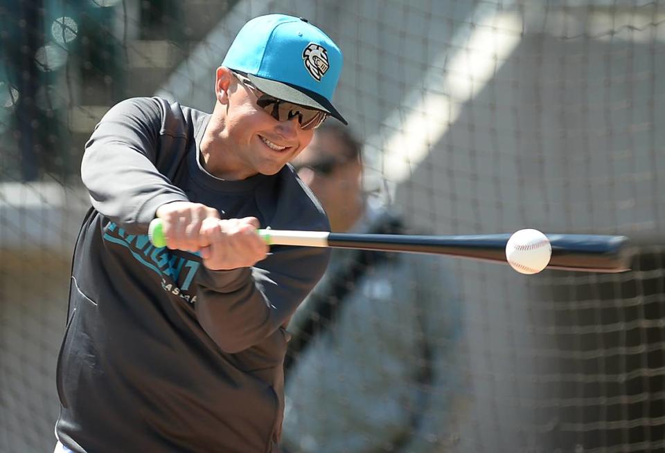 Charlotte Knights manager Justin Jirschele hits balls to infielders during the team’s media day on Wednesday, March 29, 2023 at Truist Field in Charlotte, NC.