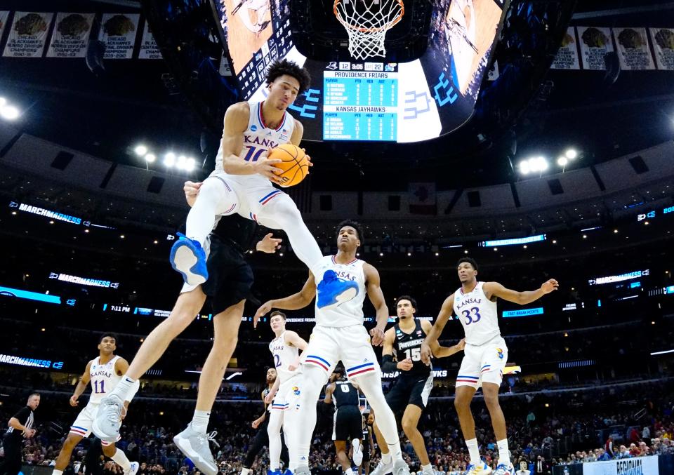 Kansas' Jalen Wilson (10) grabs a rebound during the Jayhawks' NCAA tournament victory against Providence this past season. Another quality year could see him become a NBA draft pick.