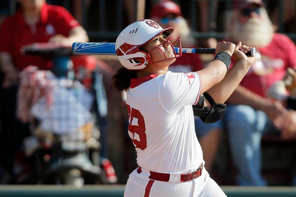 Oklahoma's Jocelyn Alo (78) hits a grand slam in the fifth inning of a Bedlam softball game between the University of Oklahoma Sooners (OU) and the Oklahoma State University Cowgirls (OSU) at Marita Hynes Field in Norman, Okla., Saturday, May 7, 2022. Oklahoma won 5-3. 