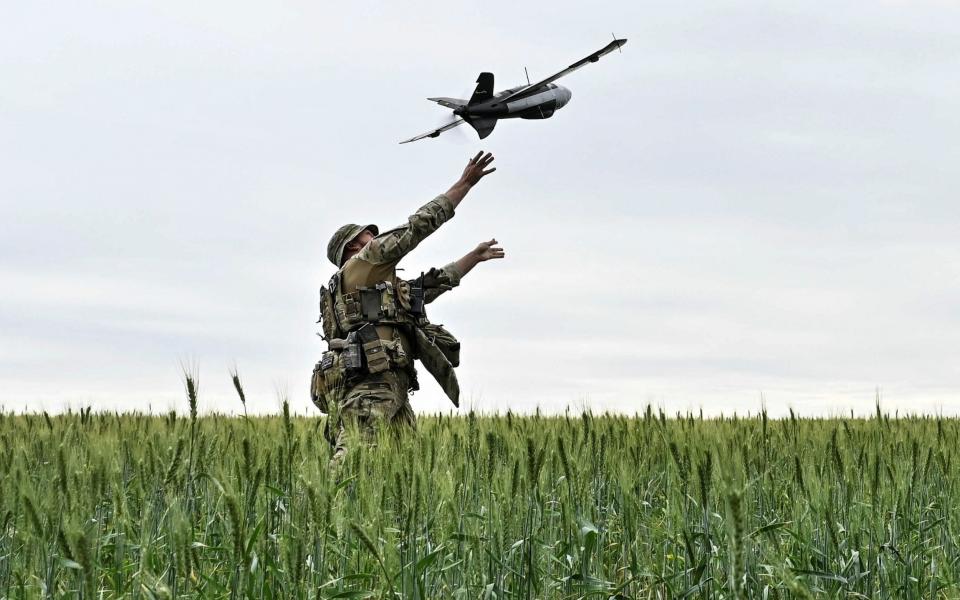 Soldier launching drone