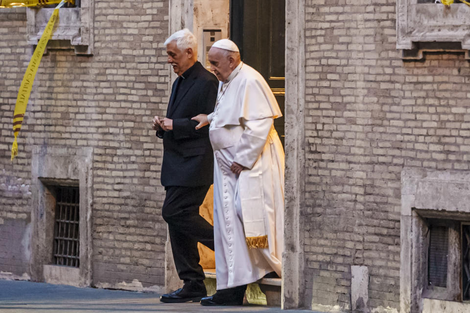 FILE - Pope Francis is flanked by Jesuits' superior general Arturo Sosa Abascal, left, after presiding a mass on March 12, 2022. Pope Francis' Jesuit religious order is weighing further disciplinary measures against the Rev. Marko Ivan Rupnik following a third church investigation into allegations he used his charismatic personality and exalted status as one of the Catholic Church's preeminent religious artists to manipulate adult women into sexual activity. Mosiacs by Rev. Marko Ivan Rupnik decorate several churches and chapels, including the Lourdes basilica. (AP Photo/Domenico Stinellis)