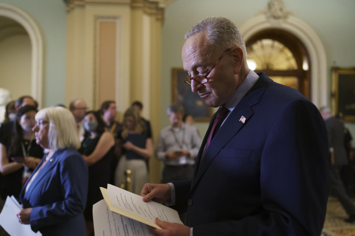 Senate Majority Leader Chuck Schumer, D-N.Y. talks to reporters about his plans for a procedural vote tomorrow on the bipartisan infrastructure deal at the Capitol in Washington, Tuesday, July 20, 2021. (AP Photo/J. Scott Applewhite)