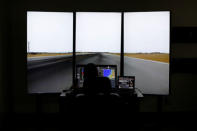Military helicopter pilot Henery Jacobs uses a flight simulator at Coast Flight Training in San Diego, California, U.S., January 15, 2019. Picture taken January 15, 2019. REUTERS/Mike Blake
