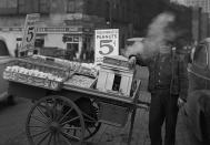 <p>Peanut man, the Battery, New York, 1946. (© Todd Webb Archive) </p>