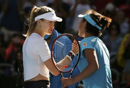 Tennis - Australian Open - Melbourne Park, Melbourne, Australia - 18/1/17 Canada's Eugenie Bouchard shakes hands after winning her Women's singles second round match against China's Peng Shuai. REUTERS/Issei Kato