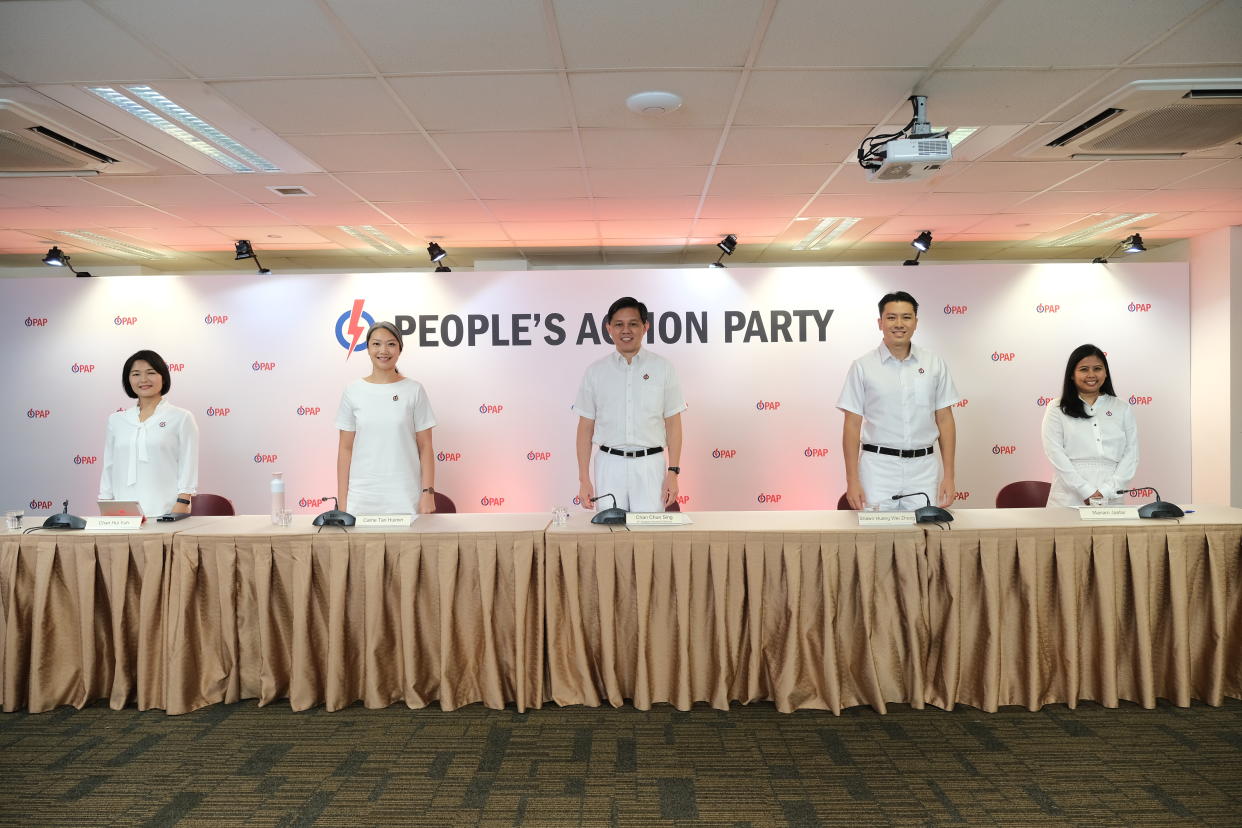 PAP second assistant secretary-general Chan Chun Sing (centre) unveils four new party candidates for the upcoming General Election: (from left) Chan Hui Yih, Carrie Tan, Shawn Huang and Mariam Jaafar. (PHOTO: PAP)