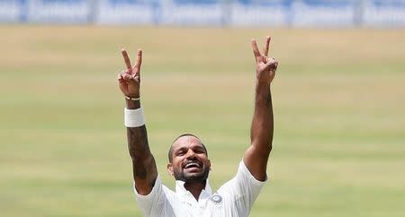 FILE PHOTO: Cricket - Sri Lanka v India - Third Test Match - Pallekele, Sri Lanka - August 12, 2017 - India's Shikhar Dhawan celebrates his century. REUTERS/Dinuka Liyanawatte/Files