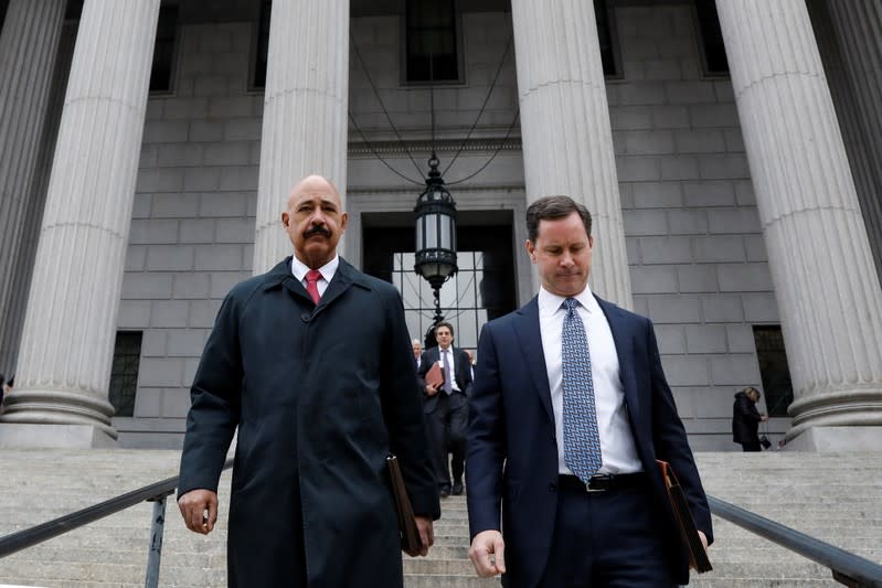 Theodore Wells, the lawyer for Exxon, exits New York State Supreme Court in New York