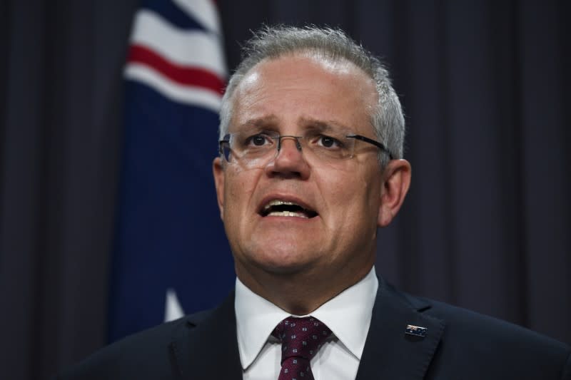 Australian Prime Minister Scott Morrison speaks during a press conference on the governments' bushfire response at Parliament House in Canberra