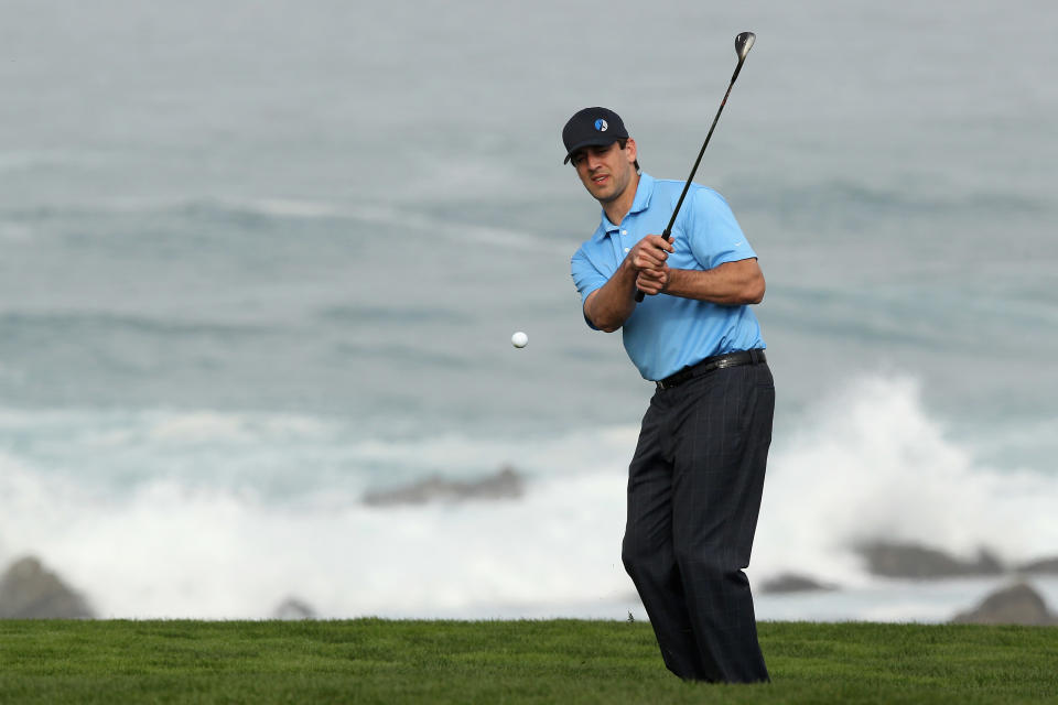 PEBBLE BEACH, CA - FEBRUARY 10: Aaron Rodgers, NFL quarterback on the Greenbay Packers, chips to the 12th green during the second round of the AT&T Pebble Beach National Pro-Am at the Monterey Peninsula Country Club (Shore Course) on February 10, 2012 in Pebble Beach, California. (Photo by Ezra Shaw/Getty Images)