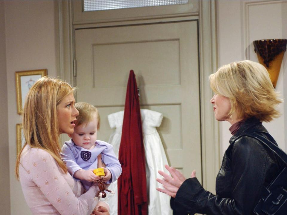 Noelle and Cali Sheldon on "Friends" set with Aniston and guest-star Christina Applegate.