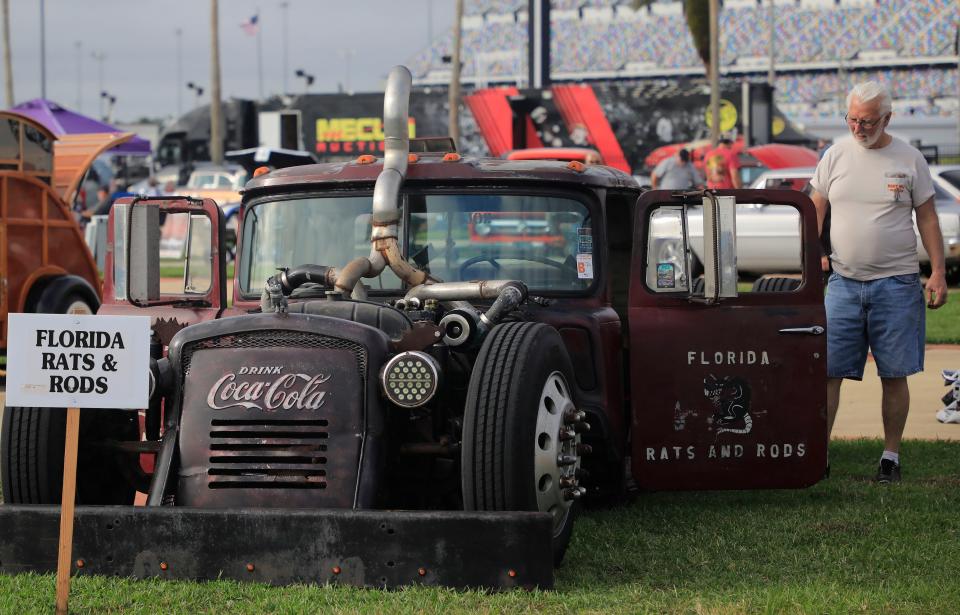 Classic car fans check out the vehicles showcased at the annual Fall Turkey Run on Saturday at Daytona International Speedway.  The event runs through Sunday in Daytona Beach.