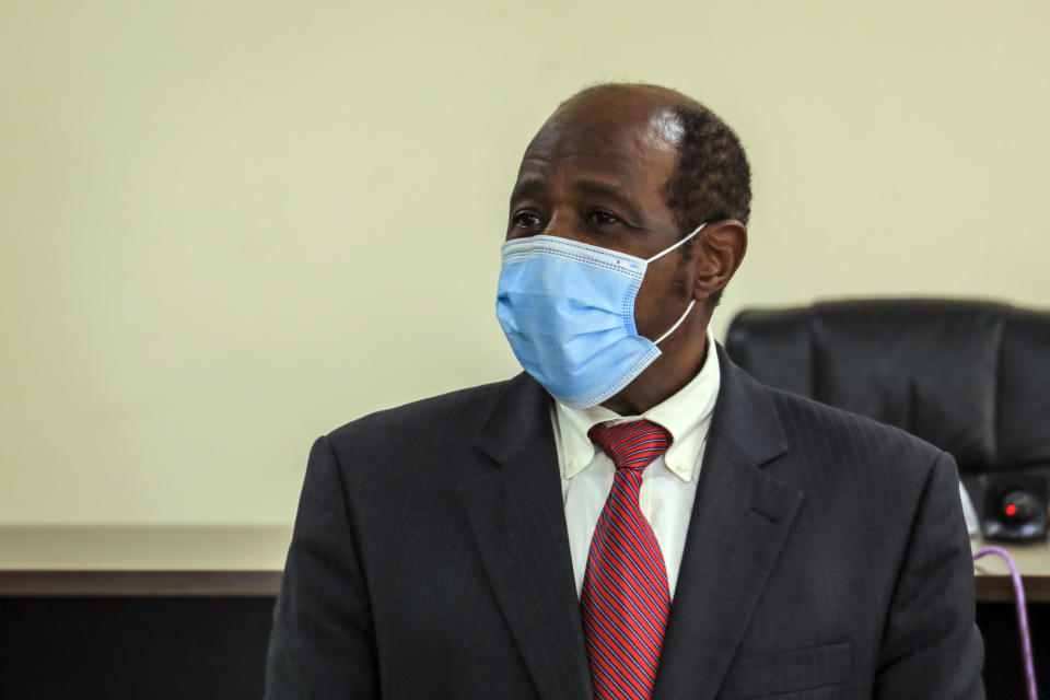 Paul Rusesabagina appears in front of media at the headquarters of the Rwanda Bureau of investigations building in Kigali, Rwanda Monday, Aug. 31, 2020. Rusesabagina, who was portrayed in the film "Hotel Rwanda" as a hero who saved the lives of more than 1,200 people from the country's 1994 genocide, and is a well-known critic of President Paul Kagame, has been arrested by the Rwandan government on terror charges, police announced on Monday, Aug. 31, 2020. (AP Photo)