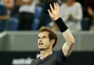 Britain's Andy Murray celebrates after winning his third round match against Portugal's Joao Sousa at the Australian Open tennis tournament at Melbourne Park, Australia, January 23, 2016. REUTERS/Thomas Peter