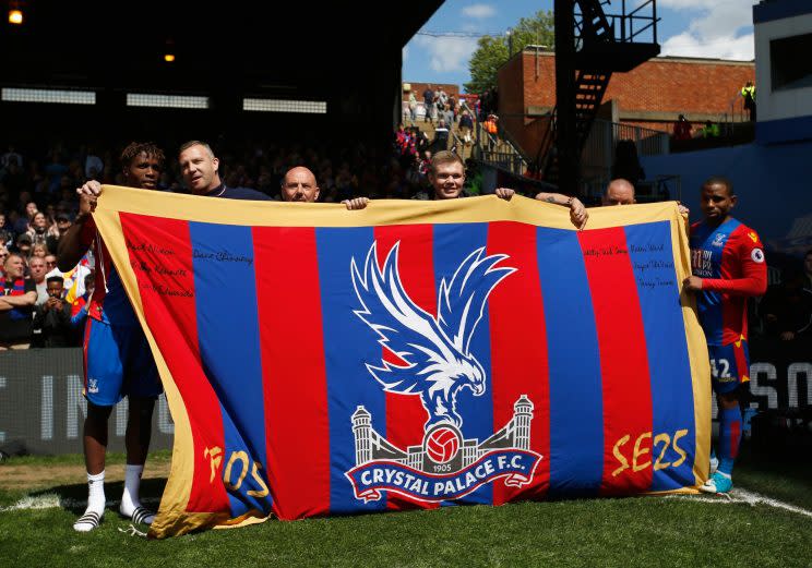 South London boys Jason Puncheon and Wilfried Zaha pose with Crystal Palace's Holmesdale Fanatics