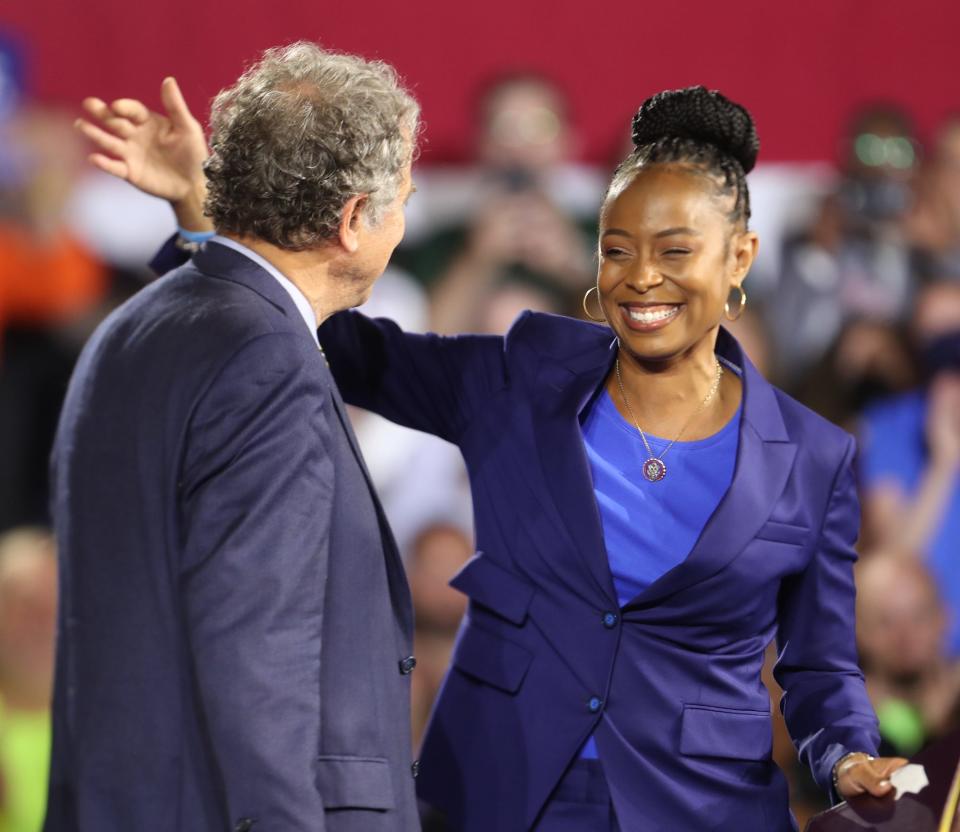 Sen. Sherrod Brown of Ohio, gets a hug from Ohio Rep. Shontel Brown.