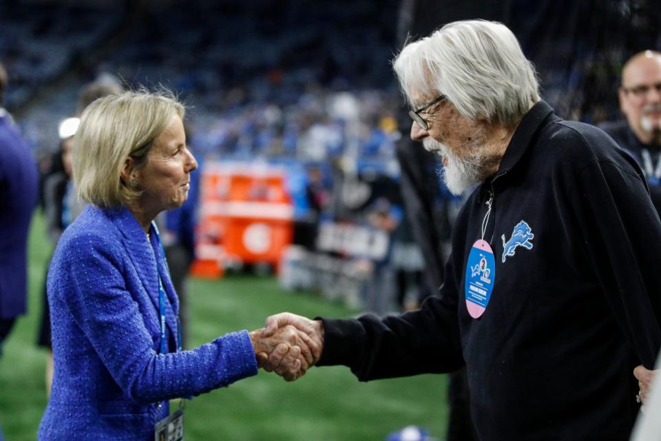 Lions principal owner and chair Sheila Hamp shakes hands with Bob Seger before the NFC divisional playoff game between the Lions and Buccaneers at Ford Field on Sunday, Jan, 21, 2024.