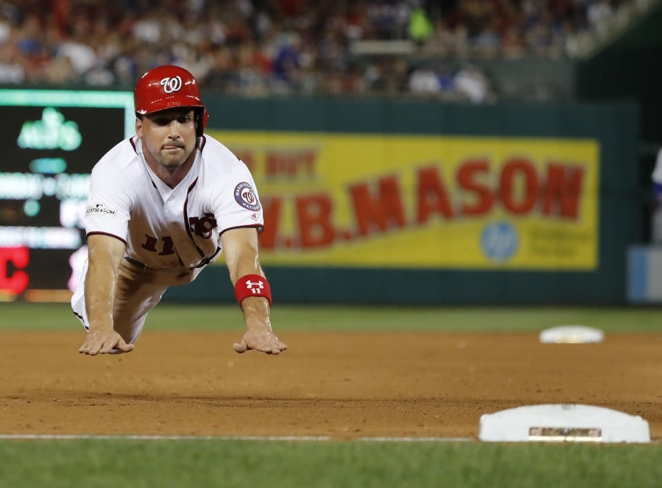 Washington Nationals’ Ryan Zimmerman dives into third base during the fifth inning in Game 2 of baseball’s National League Division Series against the Chicago Cubs at Nationals Park, Saturday, Oct. 7, 2017, in Washington. (AP)