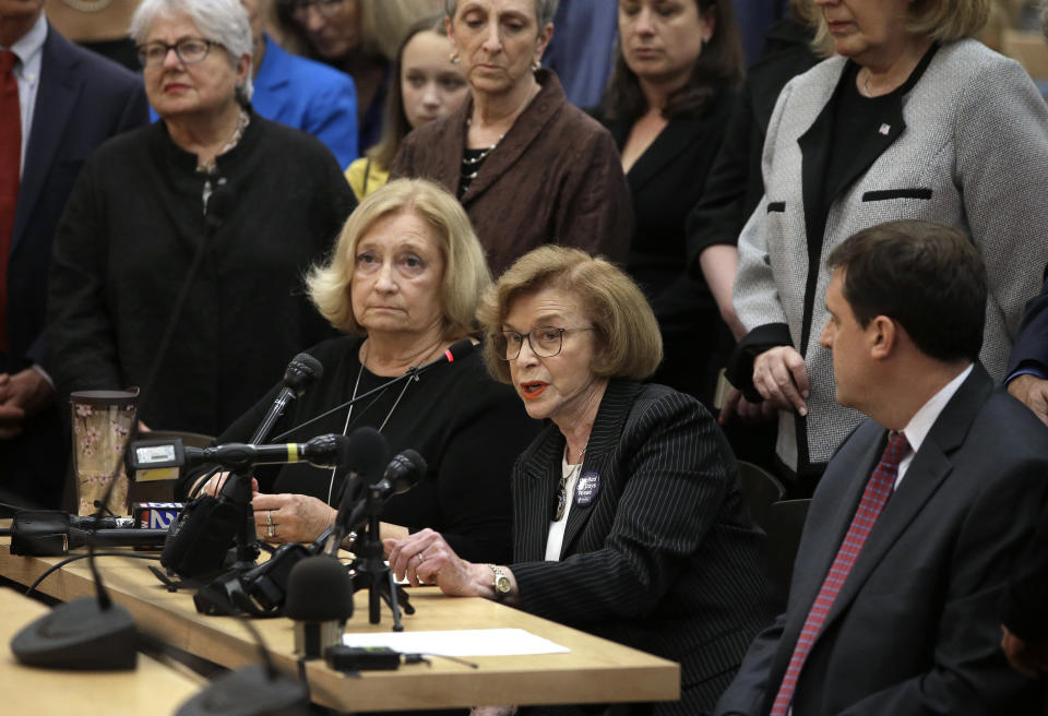 Mass. state Sen. Harriette Chandler, D-Worcester, seated center, testifies in favor of a proposed bill, called the "Roe Act" by supporters, as Mass. state Rep. Patricia Haddad, D-Bristol, seated left, and Mass. state Rep. Jay D. Livingstone, D-Boston, right, look on during a public hearing at the Statehouse, Monday, June 17, 2019, in Boston. Proponents on both sides of the abortion issue testified during the public hearing on a bill that would let women obtain an abortion after 24 weeks of pregnancy in cases of "fatal fetal anomalies." (AP Photo/Steven Senne)