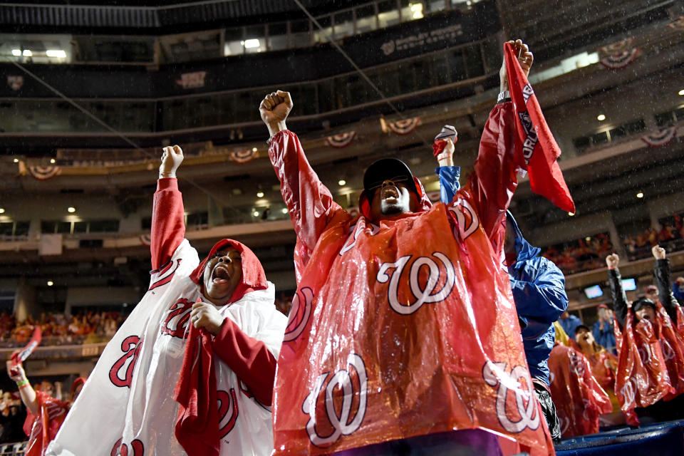 WASHINGTON, DC - OCTOBER 30: Washington Nationals fans celebrate at the Watch Party for Game 7 of the World Series against the Houston Astros at Nationals Park October 30, 2019 in Washington, DC.   The Washington Nationals beat the Houston Astros 6-2 to win the World Series.  (Photo by Katherine Frey/The Washington Post via Getty Images)