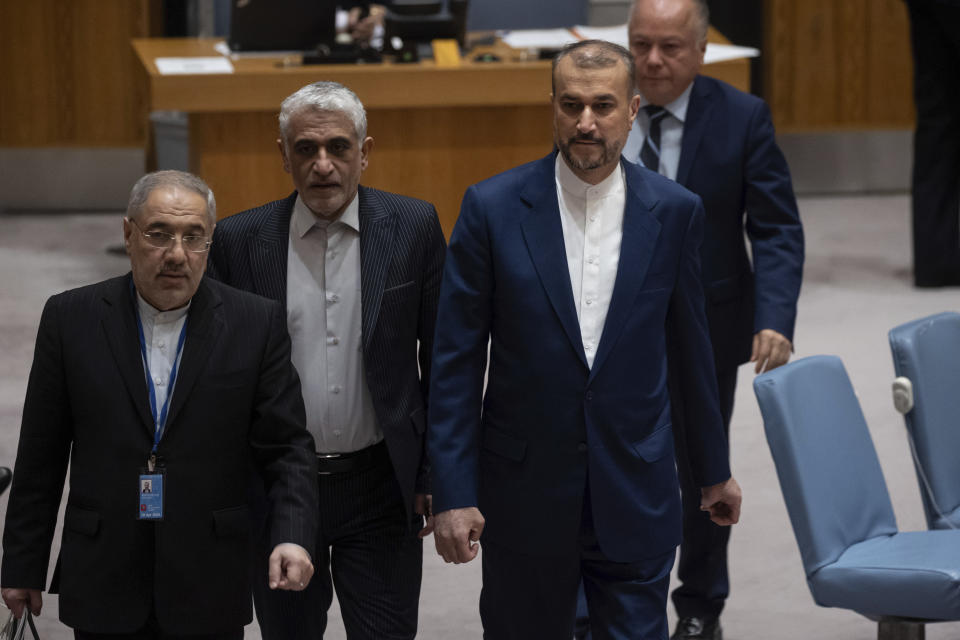 Iran's Minister for Foreign Affairs Hossein Amir-Abdollahian, right, and Iran's Ambassador to the United Nations Amir Saeid Iravani, 2nd left, arrive at a Security Council meeting at the United Nations headquarters, Thursday, April 18, 2024. (AP Photo/Yuki Iwamura)