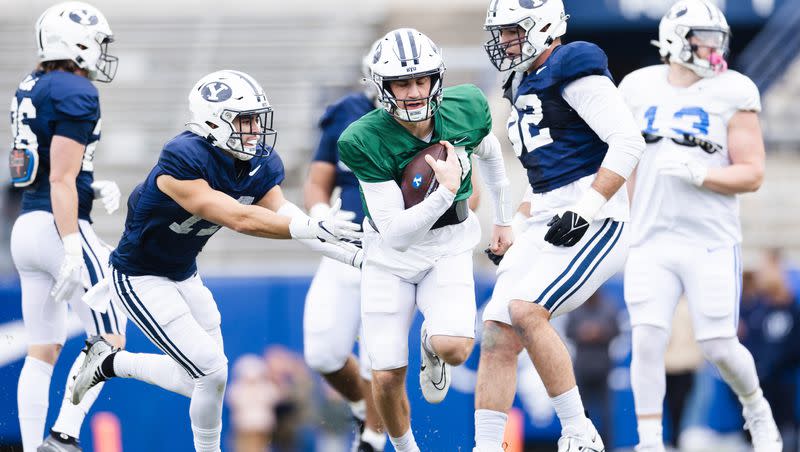 BYU quarterback Kedon Slovis runs the ball during the annual BYU Blue and White scrimmage at LaVell Edwards Stadium in Provo on Friday, March 31, 2023. Slovis was brought in via the transfer portal to help the Cougars transition to the Big 12, but will he be enough to make a difference?