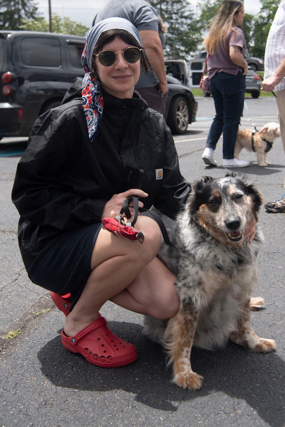 Shari Brown, 36, from West Asheville was waiting in line with Chevy, her 8-year-old cattle dog mix.