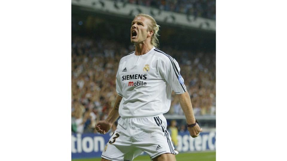 David Beckham of Real Madrid celebrates after the first goal during the UEFA Champions League Group F match between Real Madrid and Olympic Marseille at the Santiago Bernabeu Stadium on September 16, 2003 in Madrid, Spain.