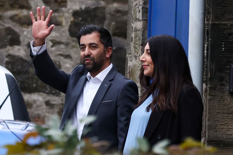 Humza Yousaf and his wife Nadia El-Nakla depart Bute House following his resignation as First minister -Credit:Getty Images