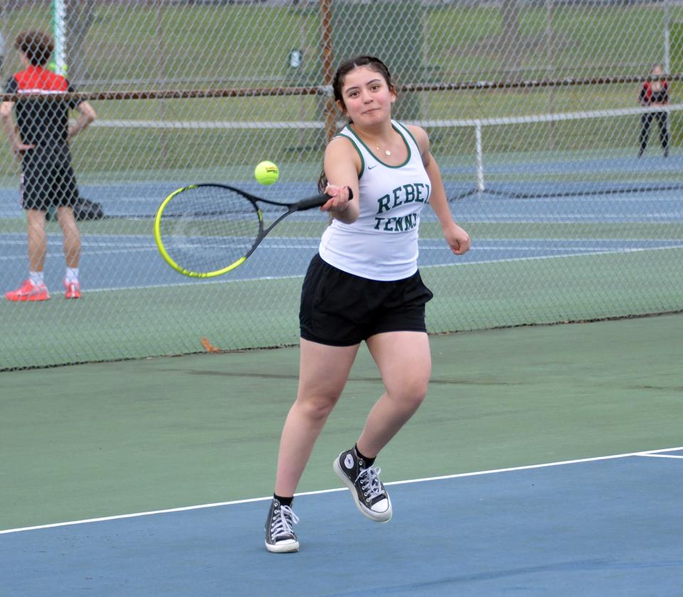 South Hagerstown's Anna Amaya hits a forehand during the girls third doubles match against North Hagerstown. The Rebels won the boys team match 4-1 and the girls team match 3-2.