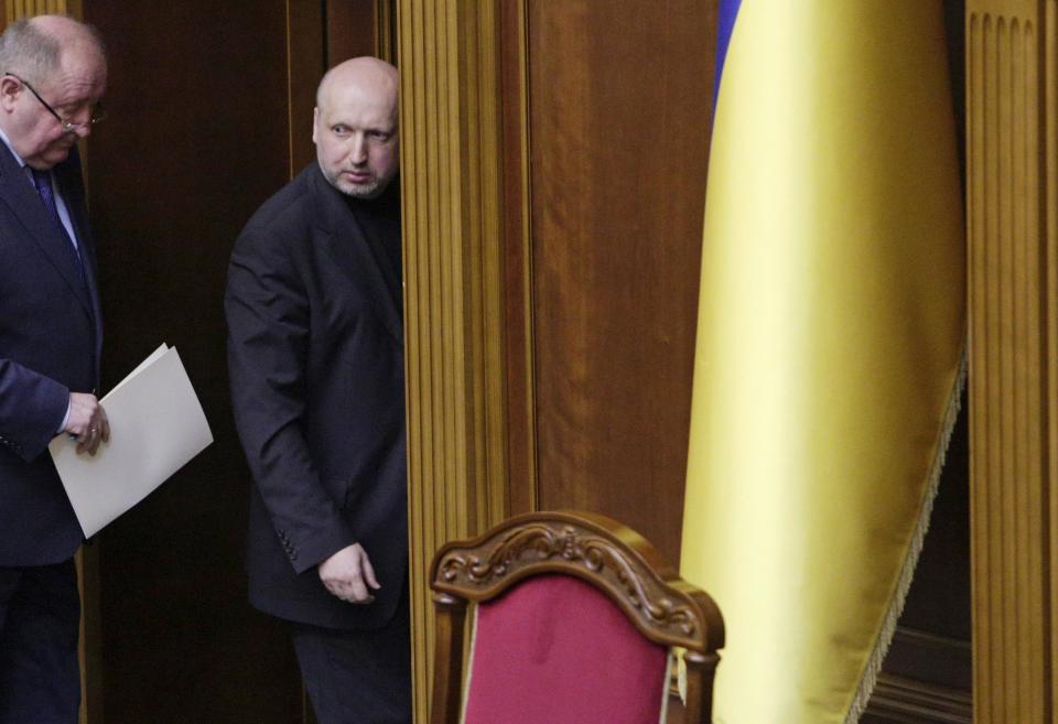 Ukraine's acting President Oleksander Turchinov attends a session of the Parliament in Kiev