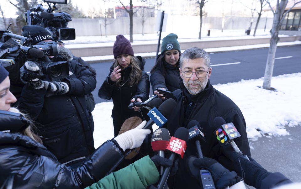 John Santoro, a resident of a condominium building where a shooting took place, speaks to media the day after the incident in Vaughan, Ontario, on Monday Dec, 19, 2022. (Arlyn McAdorey/The Canadian Press via AP)