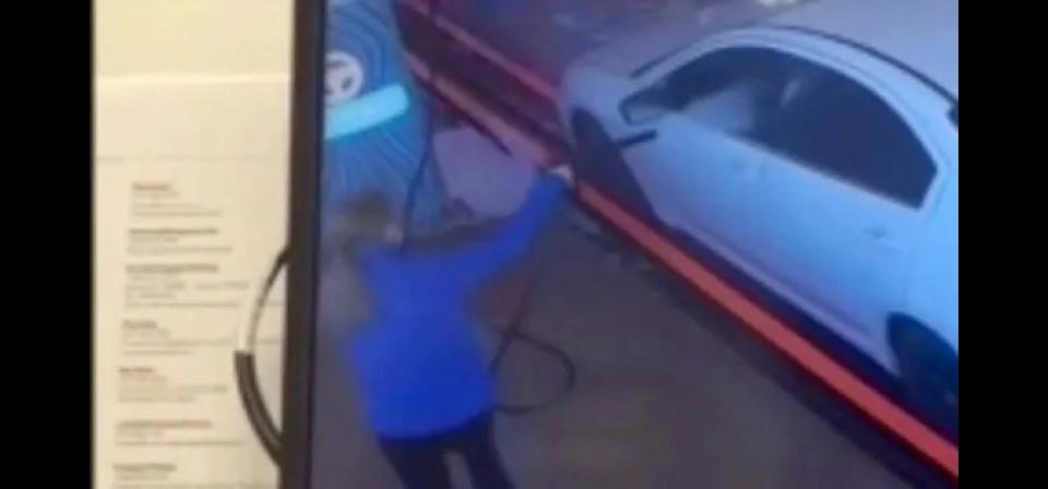 Indiana car wash worker Anna Harycki, 18, is seen in a viral video retaliating with her spray hose after she was splashed by lemonade tossed by a rude customer through her open window.