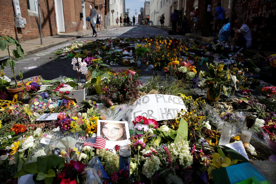 Flowers are seen on the street on Aug. 16, 2017, where Heather Heyer was killed when a suspected white nationalist plowed his car into a group of anti-racist demonstrators in Charlottesville, Va. (Photo: Joshua Roberts/Reuters)