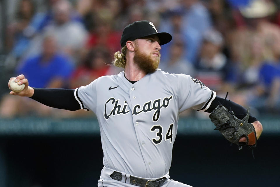 Chicago White Sox starting pitcher Michael Kopech throws during the first inning of the team's baseball game against the Texas Rangers in Arlington, Texas, Saturday, Aug. 6, 2022. (AP Photo/LM Otero)