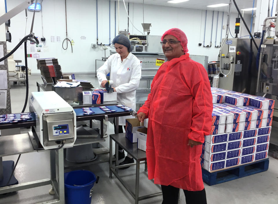 In this photo taken on Tuesday, Sept. 10, 2019, Kamal Dhutia, managing director of B I Europe Limited, a family-run firm of about 50 workers, is seen in his factory in Loughborough, England. Britain hasn’t left the European Union yet, but the tortuous Brexit process is already causing financial problems for B I Europe Limited, a family-run firm in the north of England. The reason is straightforward: Britain is still part of the 28-nation doubt bloc, and enjoys easy trading across its borders, but there have been a series of deadlines for Britain’s withdrawal from the bloc that have created uncertainty about whether a “no-deal” Brexit will abruptly bring back borders and tariffs. (AP Photo/Jeff Schaeffer)