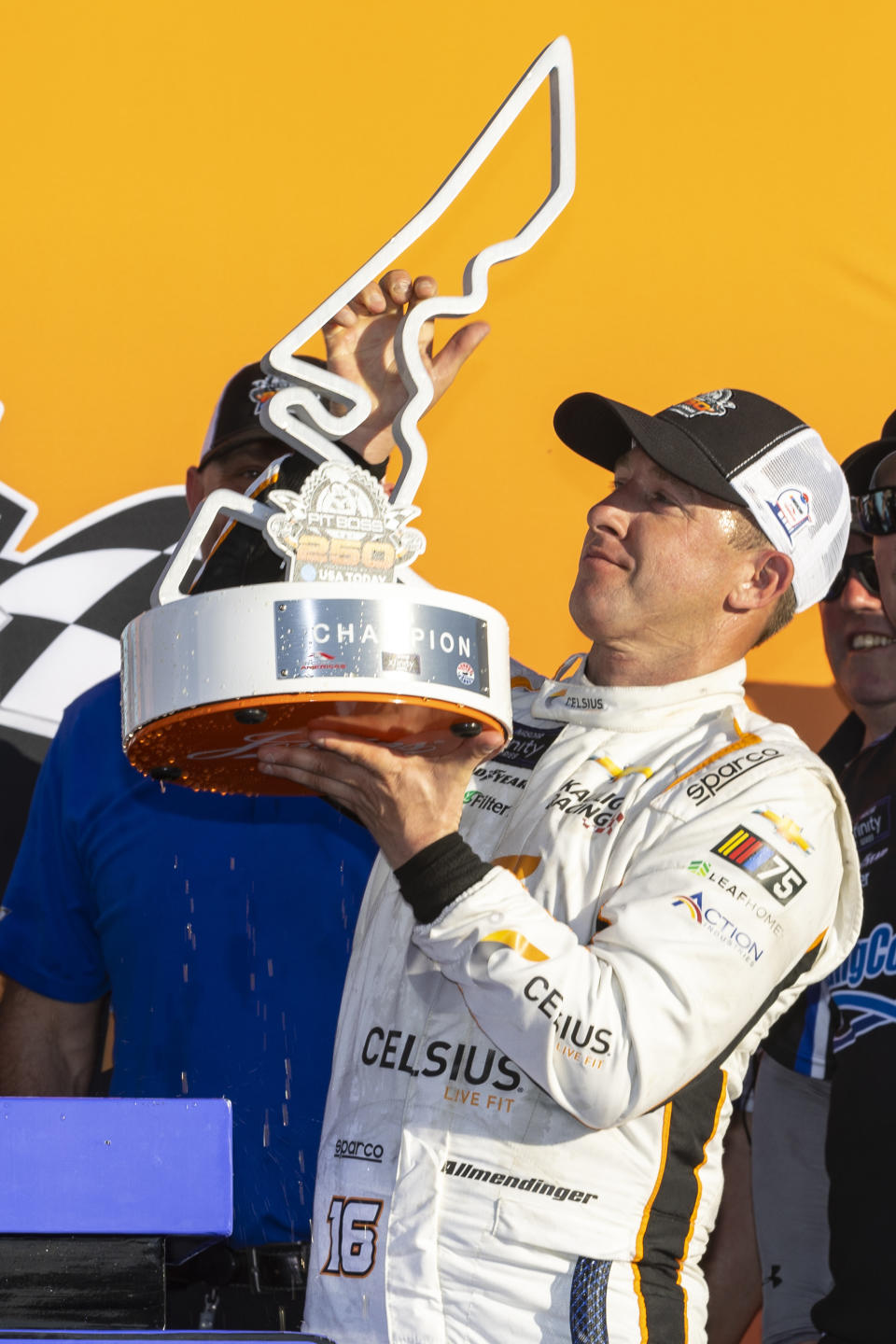 AJ Allmendinger celebrates after winning a NASCAR Xfinity Series auto race at Circuit of the Americas, Saturday, March 25, 2023, in Austin, Texas. (AP Photo/Stephen Spillman)