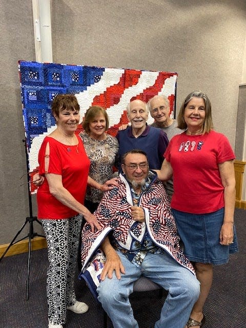 Fred Hankinson, US Army, with supporters.