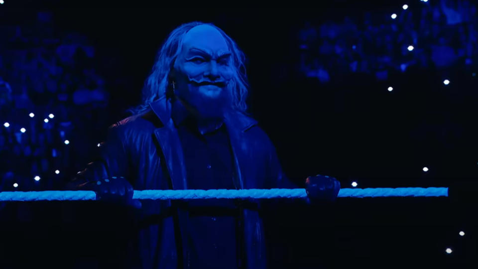  Bo Dallas as Uncle Howdy standing on the ring apron in WWE as seen in Bray Wyatt: Becoming Immortal. 