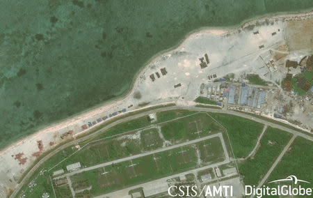 Satellite imagery shows what the CSIS Asia Maritime Transparency Initiative describes as the deployment of several new weapons systems to China’s base on Woody Island in the Paracels, South China Sea May 12, 2018. Courtesy CSIS Asia Maritime Transparency Initiative/DigitalGlobe/Handout via REUTERS