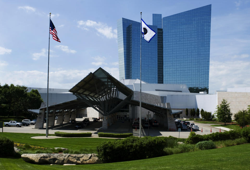 This June 10, 2012 photo shows the Mohegan Sun casino in Uncasville, Conn. A gaming slump is eating into the profits of Mohegan Sun in 2014, but the 2,000 tribal members who draw benefits from the massive casino are not feeling the pinch. The tribe’s gaming company has begun running casinos in Pennsylvania and Atlantic City, and it is pursuing more projects in states including Washington, New York, and Massachusetts. (AP Photo/Jessica Hill)