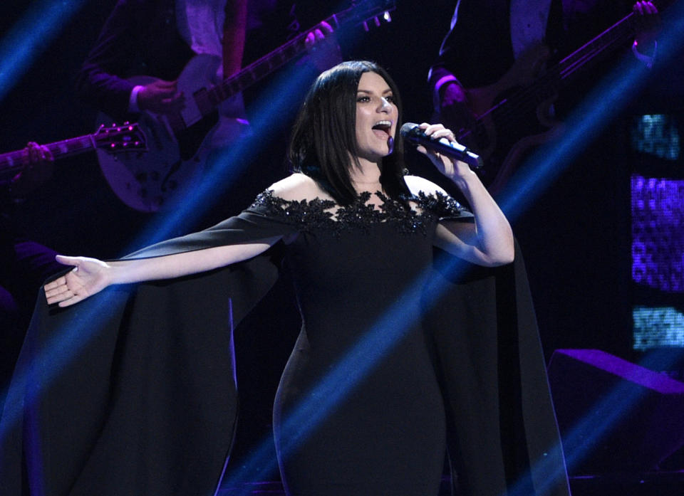 FILE - Laura Pausini performs "Lado Derecho del Corazon" at the 17th annual Latin Grammy Awards in Las Vegas on Nov. 17, 2016. Pausini will perform the Oscar nominated song "Io Si," (Seen) which she co-wrote with Diane Warren for the film "The Life Ahead." The Oscars will be broadcast on Sunday. (Photo by Chris Pizzello/Invision/AP, File)